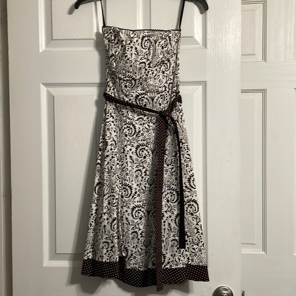 Strapless, brown and white dress.